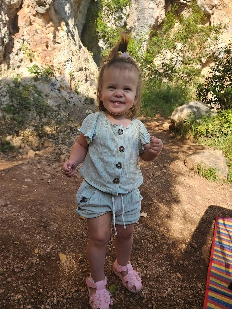 a happy girl in the mountains