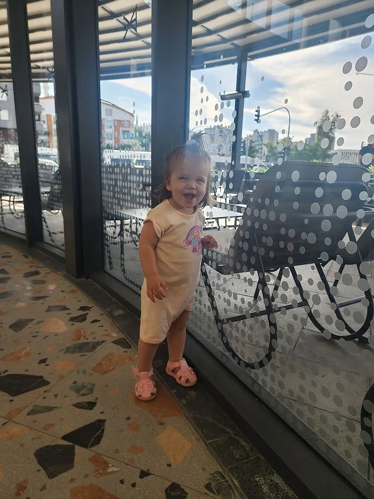 a happy girl in the local cafe
