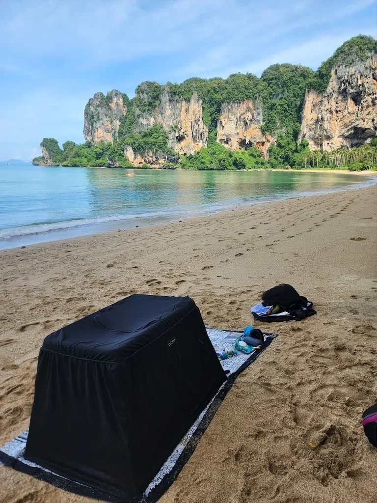 baby sleeping on the beach in thailand