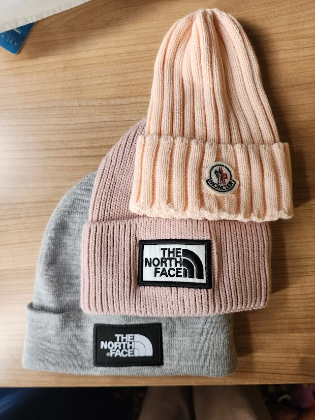 three northface beanies brought for the family in istanbul