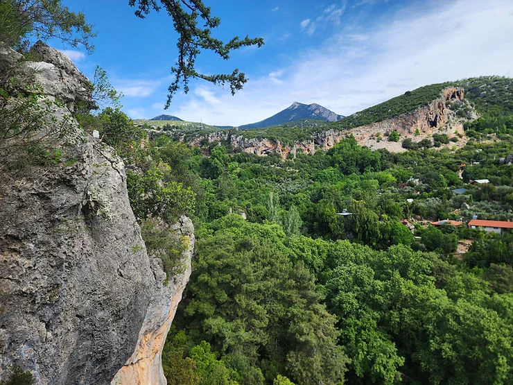 climbing the top of a cliff in geyikbayiri turkey