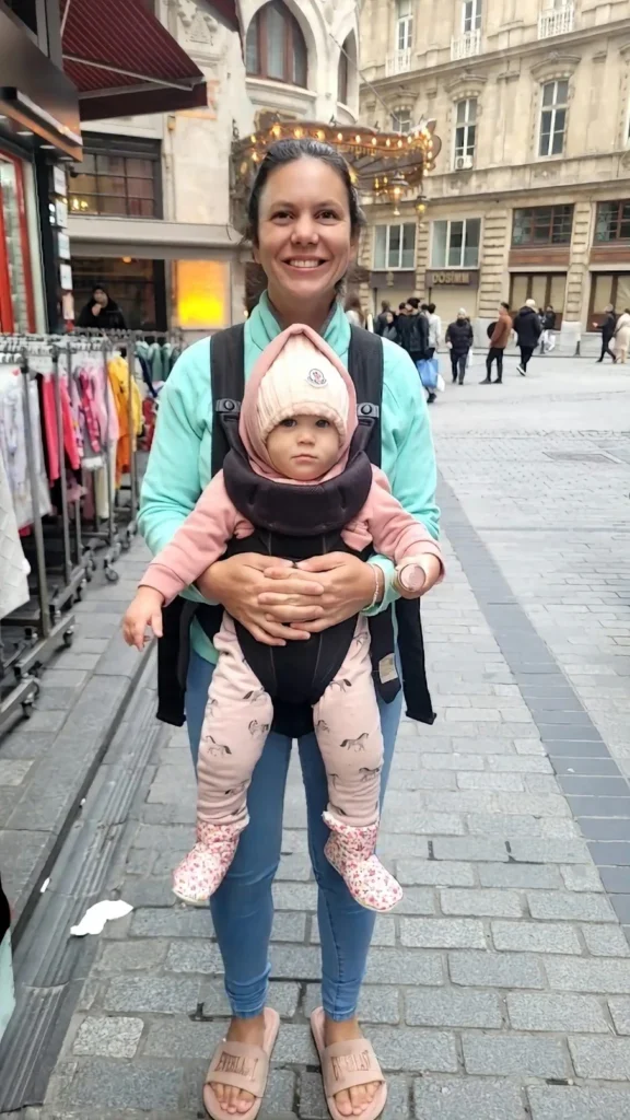 mum holding her baby on the streets of istanbul