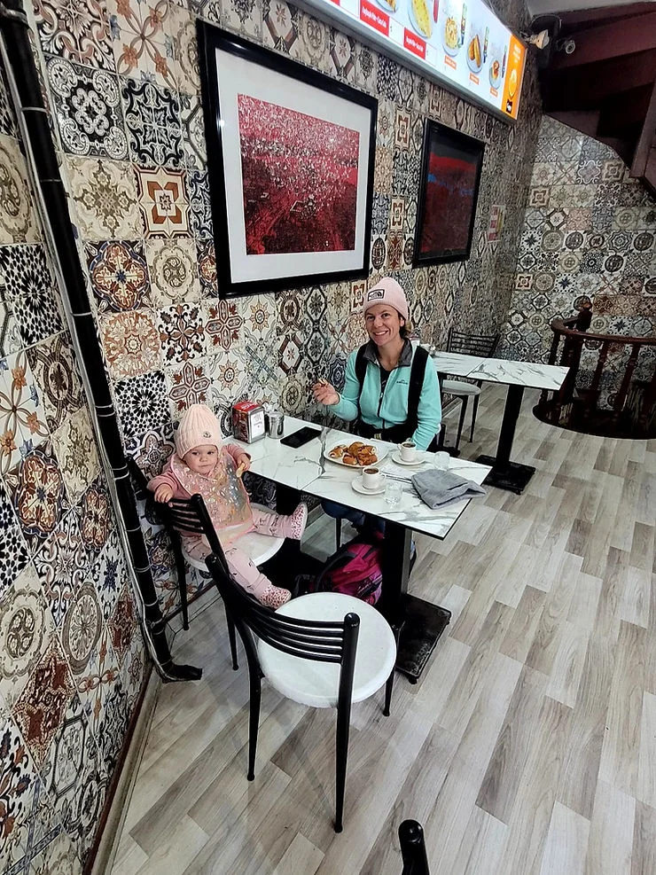 mum and daughter in a cafe in istanbul turkey