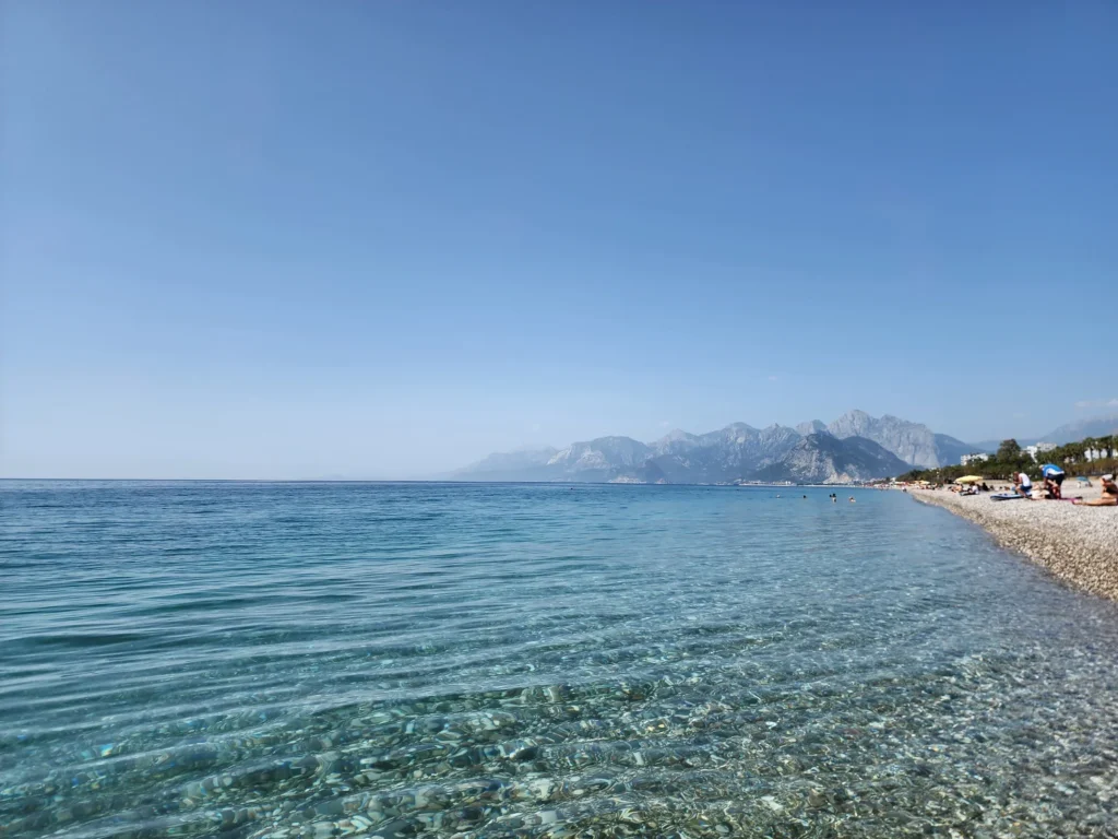 Antalya beach in Türkiye where the coast meets the mountains