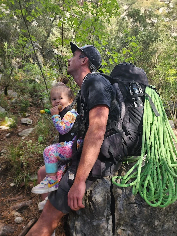 Dad hiking with his daughter in the mountains in Geyikbayırı, Türkiye