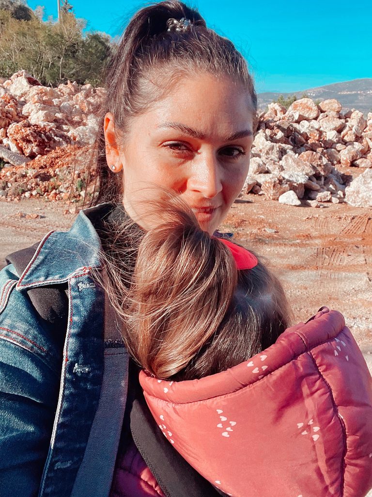 mum and her daughter in a baby carrier
